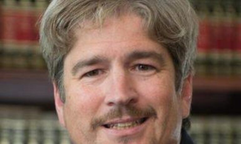 Mr. Eric A. Ballinger