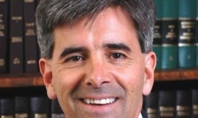 Adam B. King