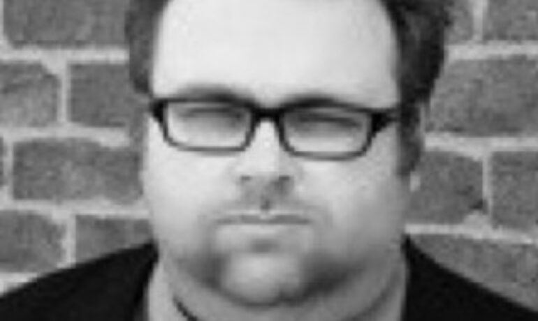 Christopher J Tamms