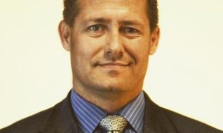 Christopher M. Ault