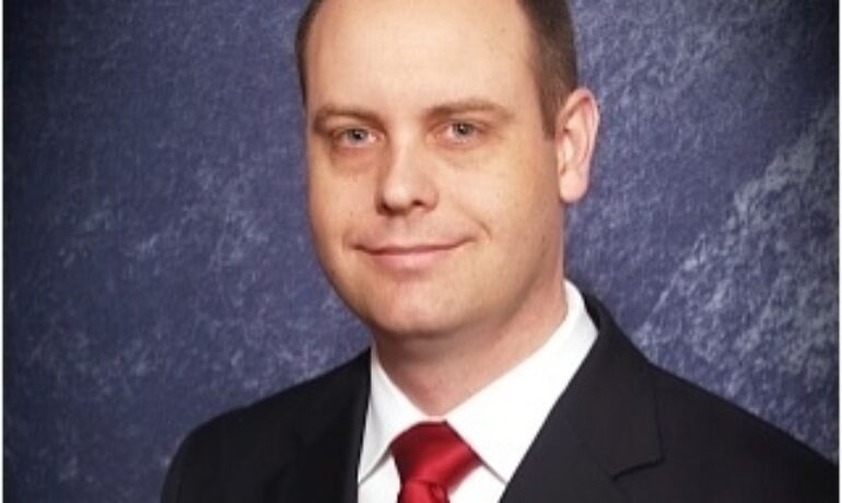 Eric M Stott