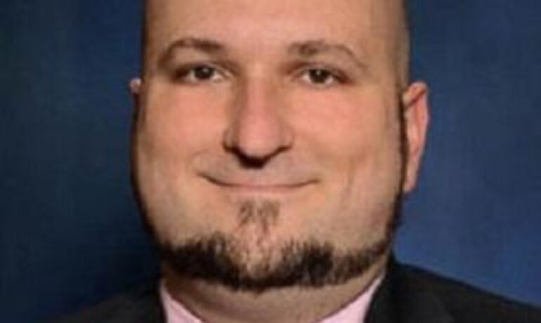 Justin K. Schwemmer