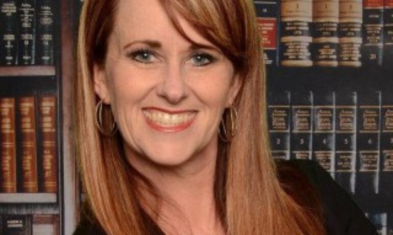 Crystal M. Etue